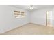 Spacious bedroom with ceiling fan and tiled floors at 711 E Laurel Dr # 13, Casa Grande, AZ 85122