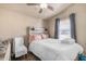 Bedroom with a full-size bed and a comfortable sitting area at 6835 W Taylor St # 208, Phoenix, AZ 85043