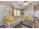 Relaxing living room featuring a sectional sofa and coffee table at 6835 W Taylor St # 208, Phoenix, AZ 85043