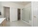 Bathroom features a large shower and a separate toilet area at 16121 W Silver Falls Dr, Surprise, AZ 85374