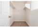 Large walk-in closet with double hanging rods at 915 E Agua Fria Ln, Avondale, AZ 85323