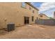 Small backyard with gravel and a block wall for privacy at 915 E Agua Fria Ln, Avondale, AZ 85323