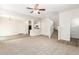 Spacious living room with stairs, open floor plan and lots of natural light at 915 E Agua Fria Ln, Avondale, AZ 85323