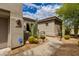 Front entry and walkway with desert landscaping at 6717 E Brilliant Sky Dr, Scottsdale, AZ 85266