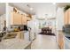 Well-equipped kitchen with ample counter space and breakfast nook at 16121 W Silver Falls Dr, Surprise, AZ 85374