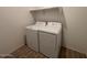 Laundry room with washer, dryer, and shelving at 47789 W Moeller Rd, Maricopa, AZ 85139