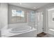 Bathroom boasts a soaking tub and a separate shower at 1308 W Macaw Ct, Queen Creek, AZ 85142