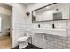 Clean bathroom with white subway tile and hexagon floor at 1319 N 44Th St, Phoenix, AZ 85008