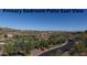 Aerial view of a luxury home community with mountain views and meticulously landscaped grounds at 10039 N Mcdowell View Trl, Fountain Hills, AZ 85268