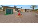 Backyard with shed, well, and gravel at 552 S Roanoke --, Mesa, AZ 85206