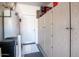Garage with storage cabinets and extra space at 42531 W Heavenly Pl, Maricopa, AZ 85138