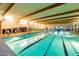 Resort-style swimming pool with lane lines at 42531 W Heavenly Pl, Maricopa, AZ 85138
