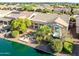 Aerial view of house, lake, and landscaping at 42531 W Heavenly Pl, Maricopa, AZ 85138