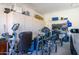 Garage with storage cabinets and exercise equipment at 42531 W Heavenly Pl, Maricopa, AZ 85138