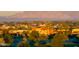 Community view with clubhouse and mountain backdrop at 42531 W Heavenly Pl, Maricopa, AZ 85138