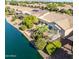 Aerial view of lakefront property and community at 42531 W Heavenly Pl, Maricopa, AZ 85138