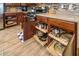 Well-organized kitchen cabinets with ample storage space for cookware and dishes at 42531 W Heavenly Pl, Maricopa, AZ 85138