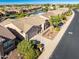 House with a lake view and surrounding neighborhood at 42531 W Heavenly Pl, Maricopa, AZ 85138