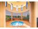 Relaxing hot tub with scenic mural at 42531 W Heavenly Pl, Maricopa, AZ 85138