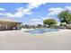 Community pool with patio and covered seating area at 20616 N Ventana W Dr, Peoria, AZ 85373