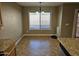 Bright dining area with tile flooring and large window at 2104 E 36Th Ave, Apache Junction, AZ 85119