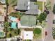Aerial view showing house, pool, and surrounding neighborhood at 73 W Lewis Ave, Phoenix, AZ 85003