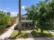 Charming two-story home with a brick facade and manicured lawn at 73 W Lewis Ave, Phoenix, AZ 85003