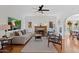 Bright living room featuring a fireplace and hardwood floors at 73 W Lewis Ave, Phoenix, AZ 85003