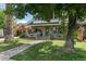 Charming two-story house with brick front and porch at 73 W Lewis Ave, Phoenix, AZ 85003