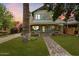 Charming two-story house with a brick front and porch at 73 W Lewis Ave, Phoenix, AZ 85003