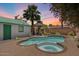 Relaxing kidney-shaped pool with spa and gazebo at 73 W Lewis Ave, Phoenix, AZ 85003