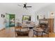 Bright living room with fireplace, hardwood floors, and lots of natural light at 73 W Lewis Ave, Phoenix, AZ 85003