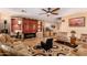 Gathering room with a barn door concealing a fireplace at 2104 E 36Th Ave, Apache Junction, AZ 85119