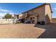 Large backyard with gravel, above ground pool and home at 2104 E 36Th Ave, Apache Junction, AZ 85119