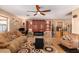 Gathering room with a barn door concealing a fireplace at 2104 E 36Th Ave, Apache Junction, AZ 85119