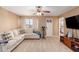 Bright loft with sectional sofa, exercise equipment, and entertainment center at 2104 E 36Th Ave, Apache Junction, AZ 85119