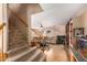 Carpeted staircase with wooden railings offering access to the upper level at 2104 E 36Th Ave, Apache Junction, AZ 85119