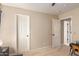 Hallway with two doors leading to bedrooms or bathrooms at 2104 E 36Th Ave, Apache Junction, AZ 85119