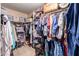 Large walk-in closet with ample shelving and hanging space at 2104 E 36Th Ave, Apache Junction, AZ 85119