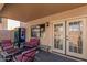 Patio with table and chairs, overlooking a backyard pool and neighborhood at 2104 E 36Th Ave, Apache Junction, AZ 85119