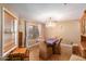 Formal dining room with chandelier and built-in hutch at 2104 E 36Th Ave, Apache Junction, AZ 85119