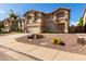 Two-story house with a two-car garage and gravel landscaping at 2104 E 36Th Ave, Apache Junction, AZ 85119