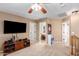 Versatile loft space with TV, plenty of seating, and access to a bathroom at 2104 E 36Th Ave, Apache Junction, AZ 85119