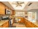 Bright kitchen with granite countertops and stainless steel appliances at 5119 W Onyx Ave, Glendale, AZ 85302