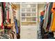 Organized closet with shelving and drawers for storage at 5119 W Onyx Ave, Glendale, AZ 85302