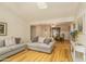 Open living room with hardwood floors and views into dining area at 5119 W Onyx Ave, Glendale, AZ 85302