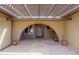 Brick entryway with arched doorway and covered pergola at 5119 W Onyx Ave, Glendale, AZ 85302