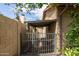 Fenced side yard with gate and gravel at 5119 W Onyx Ave, Glendale, AZ 85302