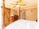 Main bedroom with barn door and en-suite bathroom access at 5119 W Onyx Ave, Glendale, AZ 85302
