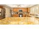 Spacious kitchen featuring granite countertops and modern appliances at 5119 W Onyx Ave, Glendale, AZ 85302